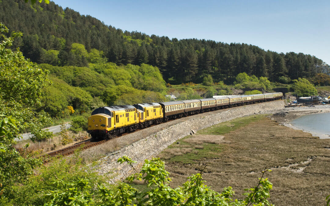 97304 John Tiley and 97303 amble along the Dovey estuary at Frongoch with Pathfinder Tours The Cambrian Coast Express  1Z30 05:39 Bristol Temple Meads to Pwllheli, the first charter to run to Pwllheli under ERTMS conditions.